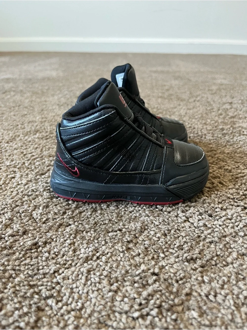 Nike Black Sneakers with Red Accents